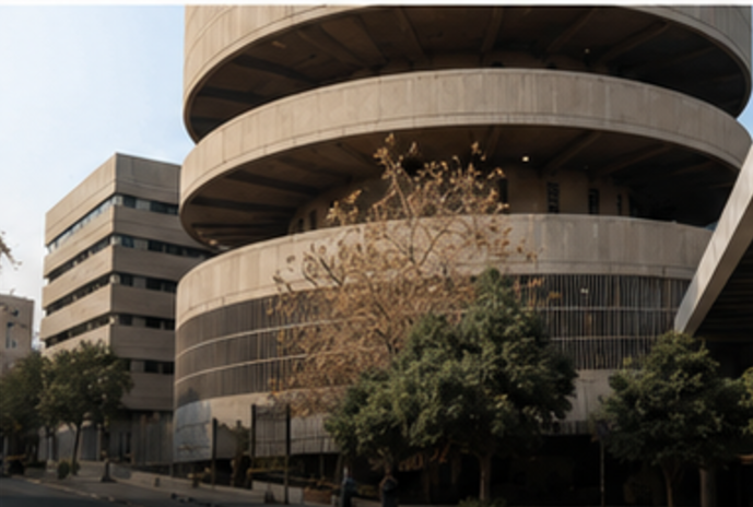 Curved modernist concrete building in central Athens